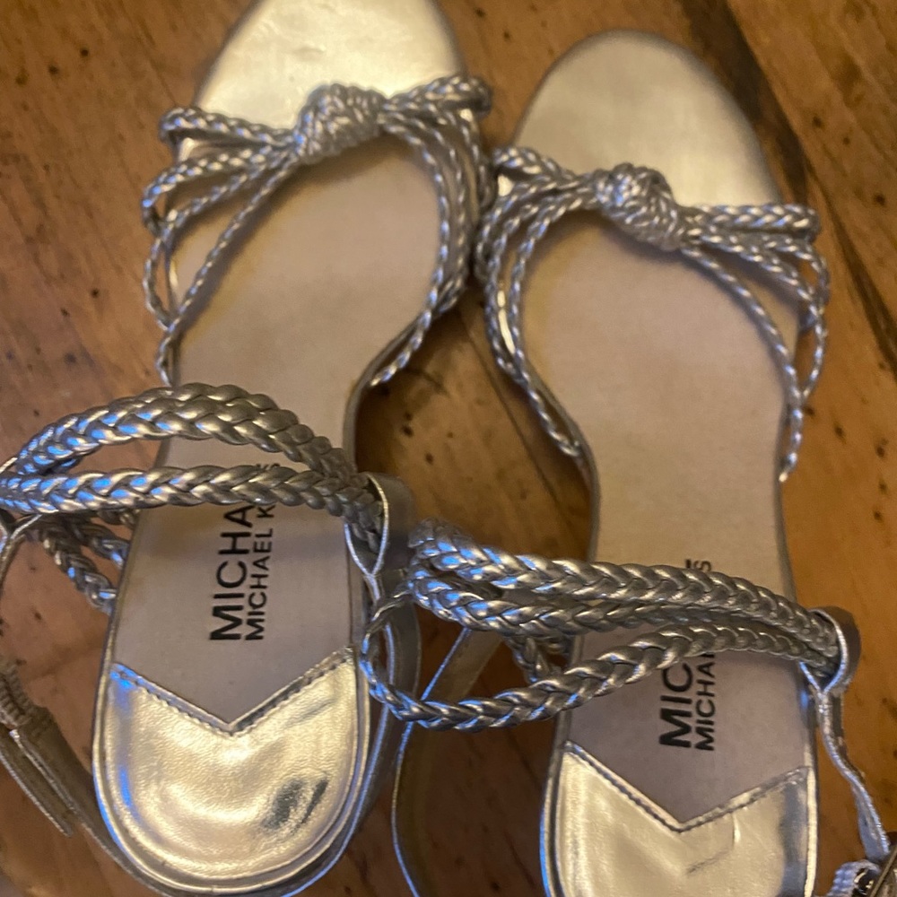 Beautiful Michael Kors silver wedge sandals . Minimal wear.